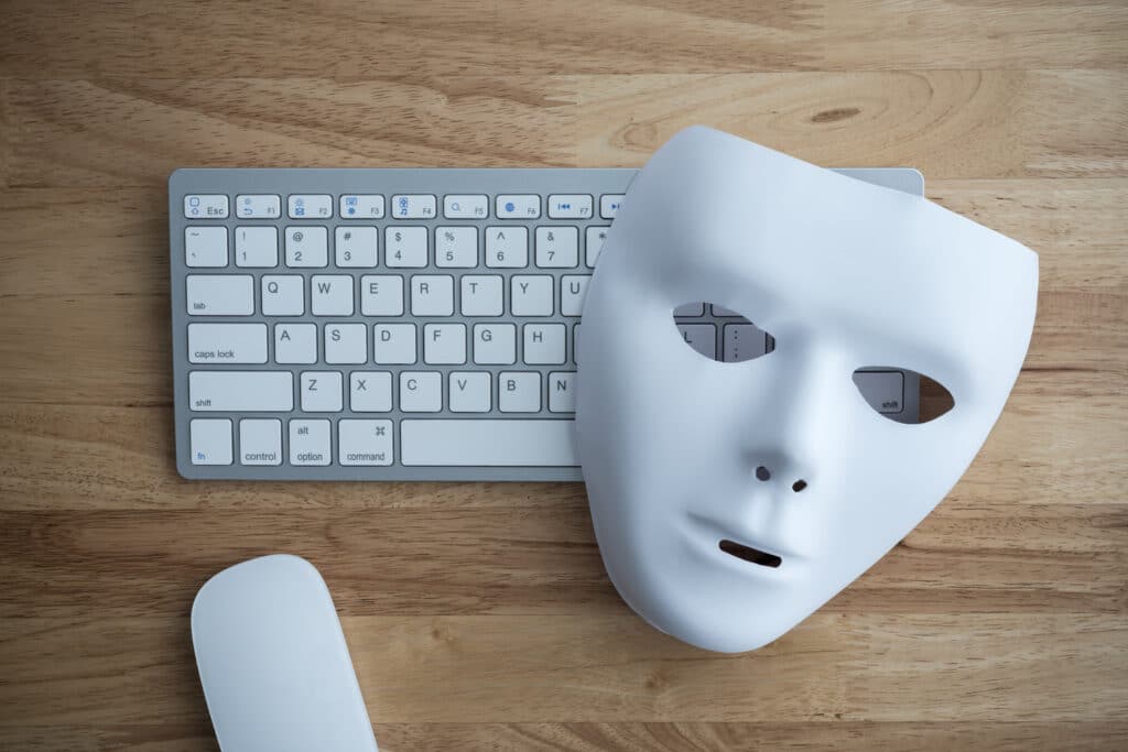 keyboard with a mask resting on it