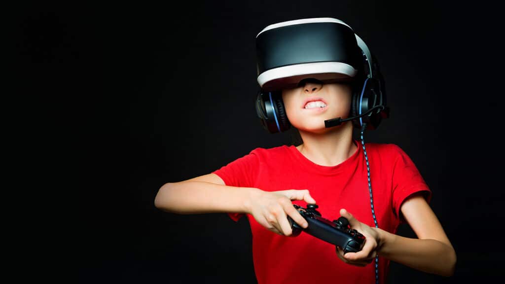 young boy using virtual reality headset